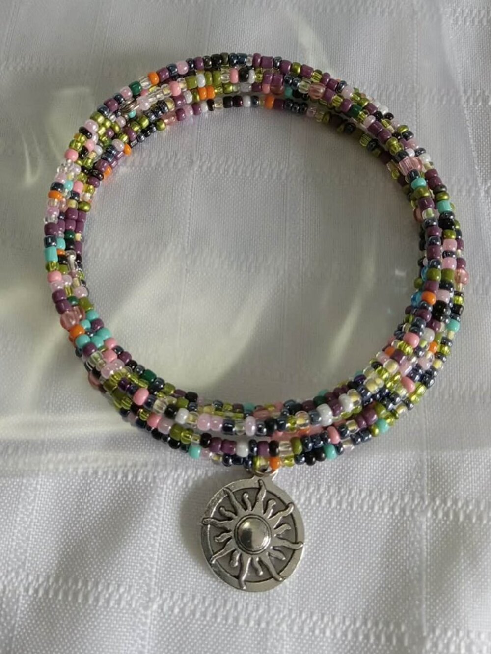 Handmade memory wire bracelet with beads and pendant